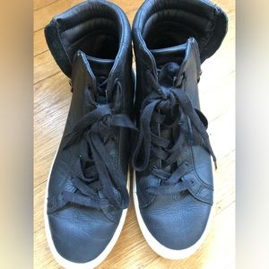 Ugg mid/high rise sneakers with side zipper. Leather, water resistant, size 9